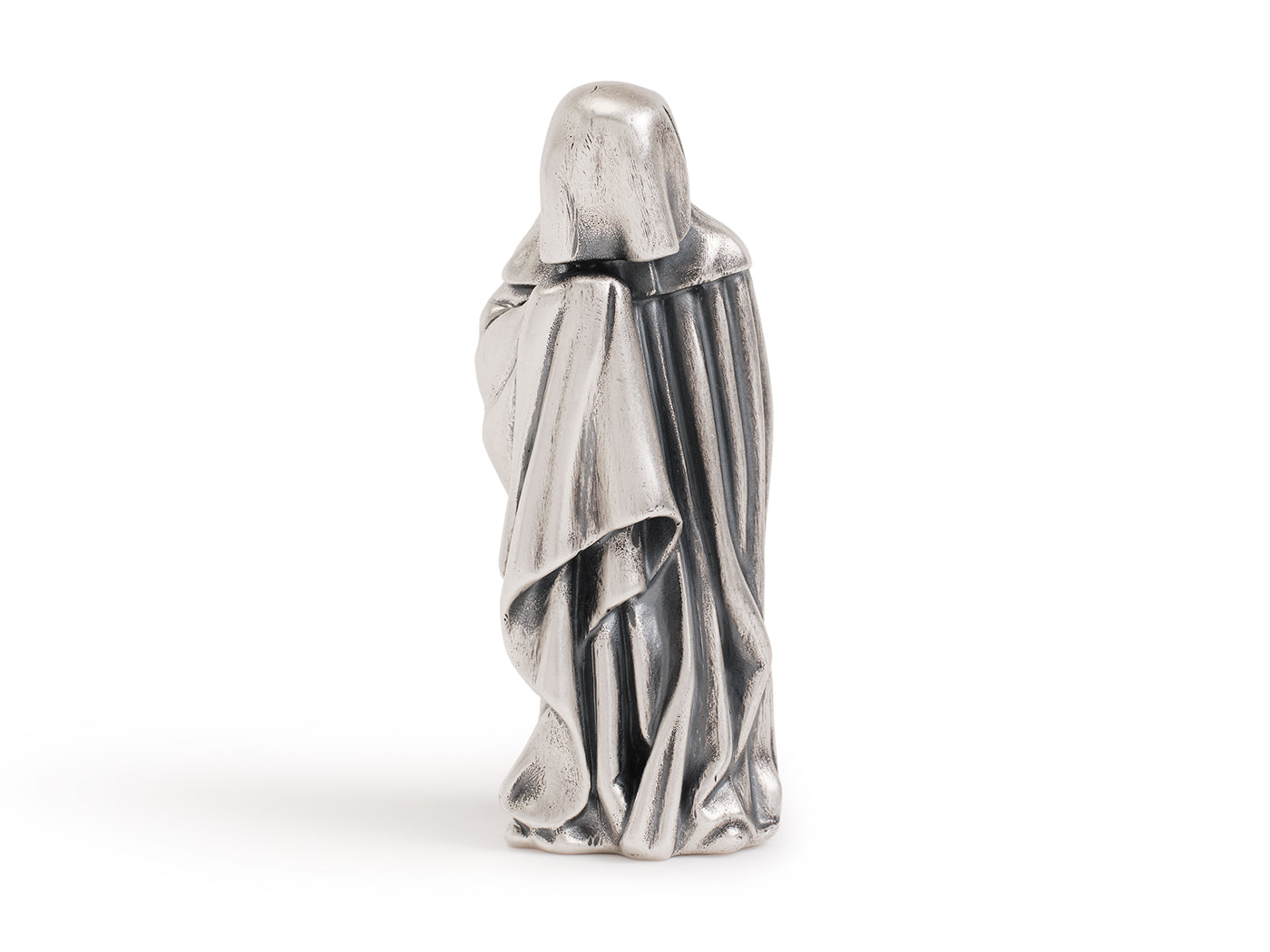 Silver statue of a draped figure on a white background